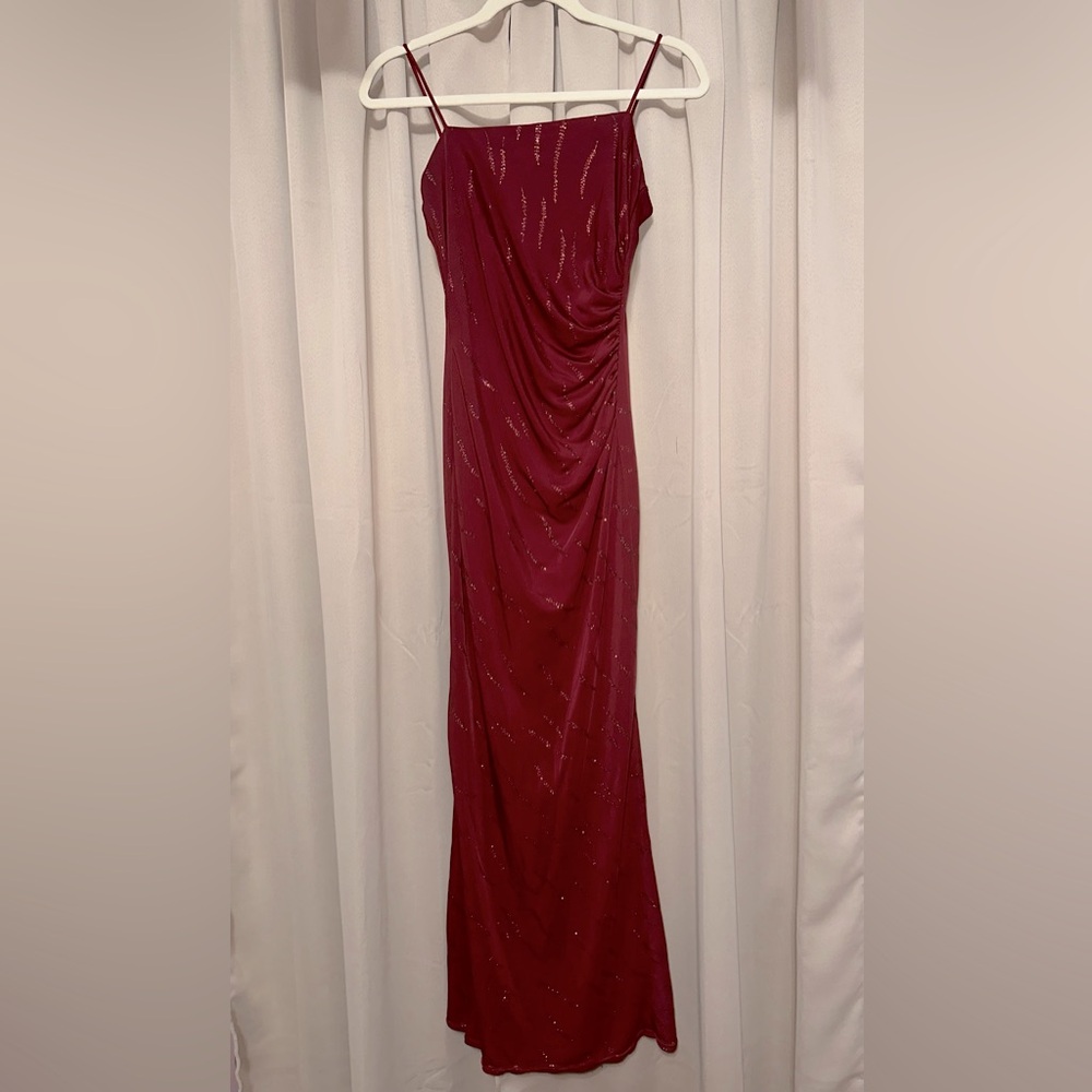 Blondie Nites - red dress with sparkly designs.